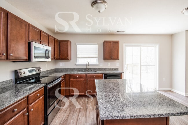 Photo - A must see 4-bedroom, 2.5 bath home in Oak Pointe.