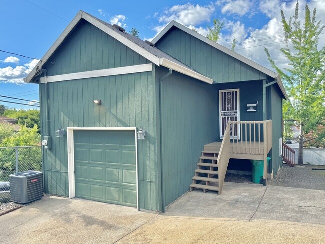 Building Photo - Montavilla Polished 2-Story with Hardwoods, Whole House A/C, Attached Garage, Off-street Parking