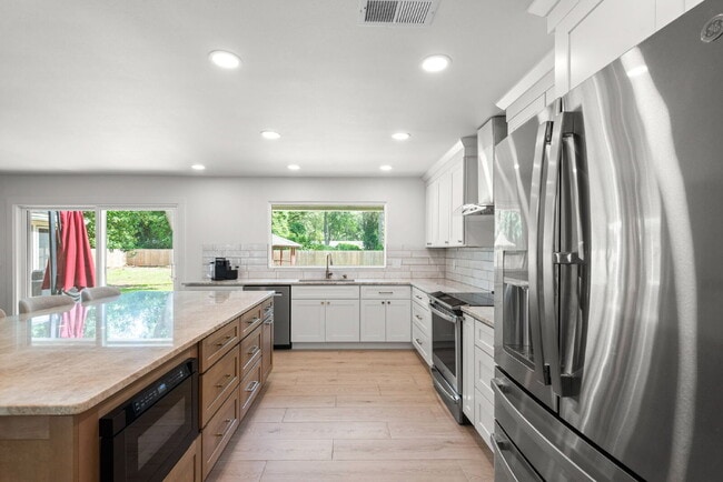 Photo - "Renovated 4-Bedroom in Rocky Bayou Estates!"
