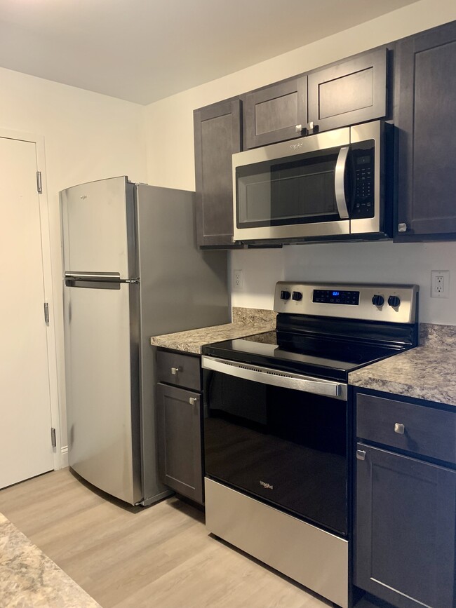 Updated Kitchen - Natick Village Apartments