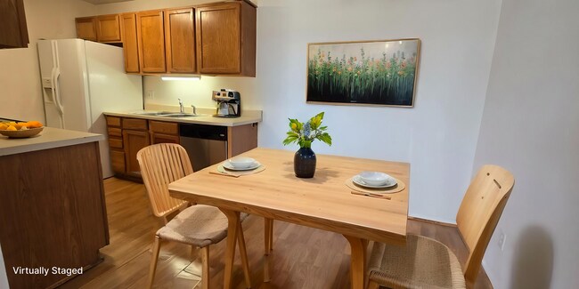 Photo - Top-floor 2-bedroom, 1-bath condo in Thornton with lots of natural light. Unidad 1-301