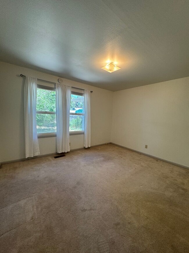 Photo - 2 bed 1 bath with large attached garage and fenced yard