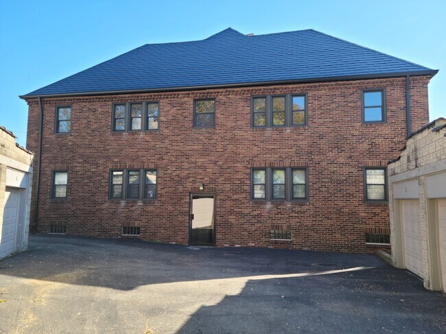 Building rear parking area - Ridgewood Ave Apartments