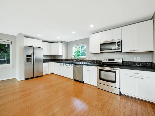 Photo - Welcome to this charming 3-bedroom, 2-bathroom home