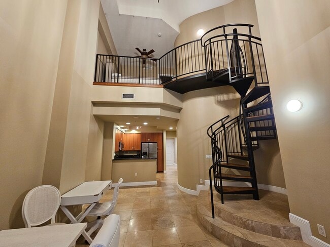 First floor living area and kitchen - 801 S Olive Ave Condo Unit 101