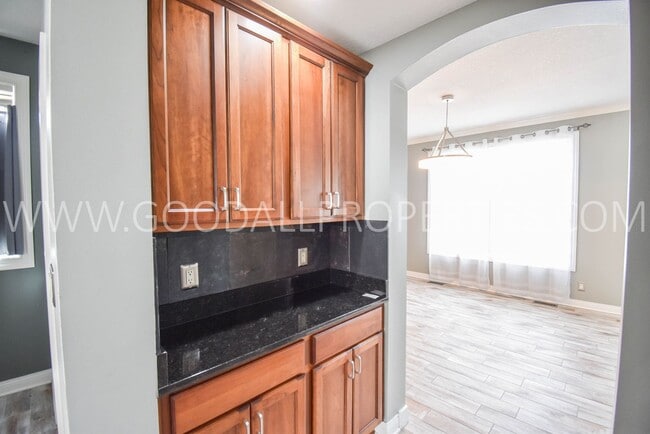 Photo - 4 Bedroom 4 Bath Executive Home in West Des Moines with a fenced in yard and a 3-car garage