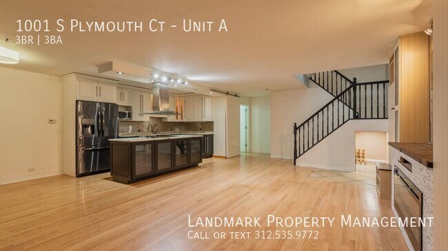 Photo - 1001 S Plymouth Ct Unit A Unidad A