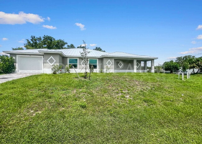 Photo - Spacious 3-Bedroom Duplex Retreat with 2 Full Baths in Prime Lehigh Acres Location!