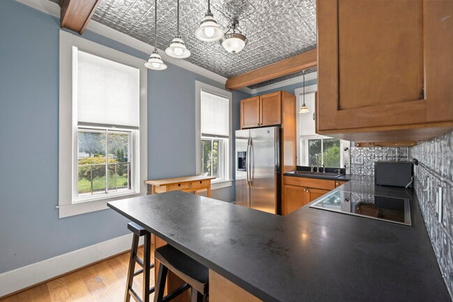 161 E College Ave