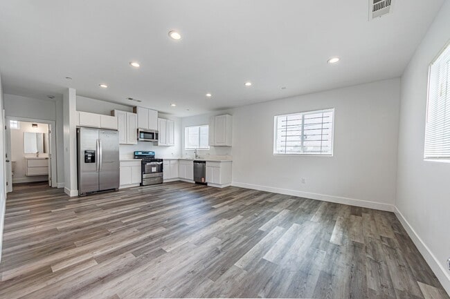 Photo - Spacious 4-Bedroom, 3-Bath Home – Modern Upgrades & Parking Included Unit 2833 1/2