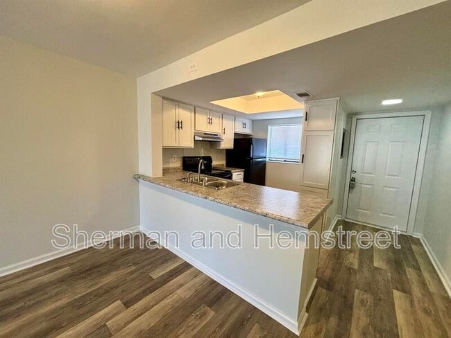 Photo - 607 Windsong Cir