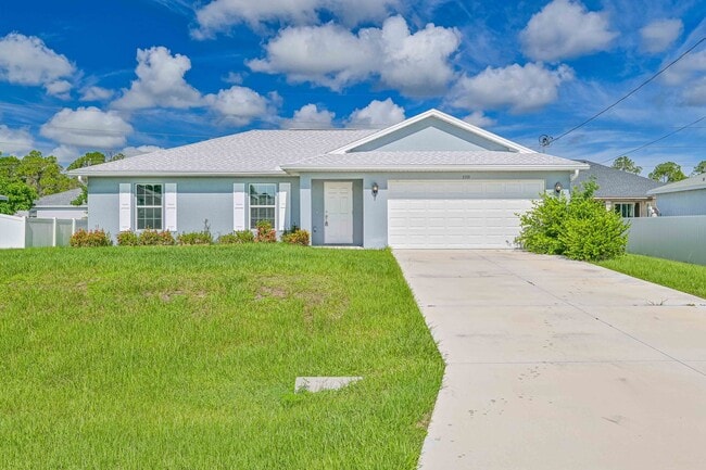 Building Photo - Spacious Three-Bedroom Home with Open Floor Plan, Large Yard