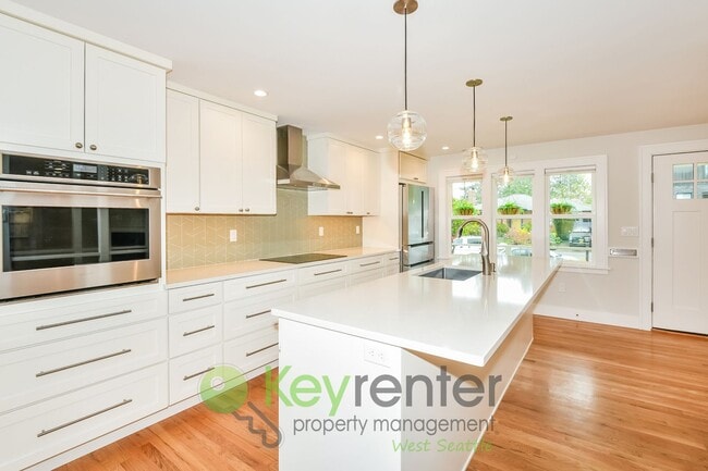 Photo - Stylish Four Bedroom Home with Hardwood Floors and Outdoor Space