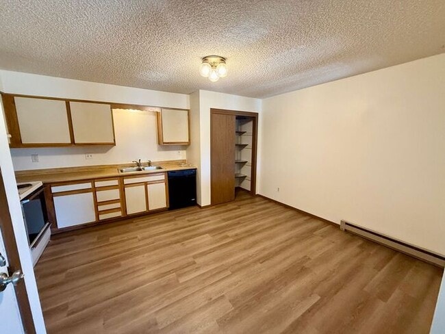 Photo - Limited-Time Move-In Deal: Get Your First 2 Weeks FREE! Spacious 2 Bed, 1 Bath Apartments + Water...