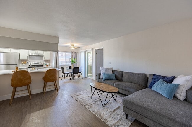 Renovated Living Room at Sunset Winds Apartments in Henderson, NV 89014