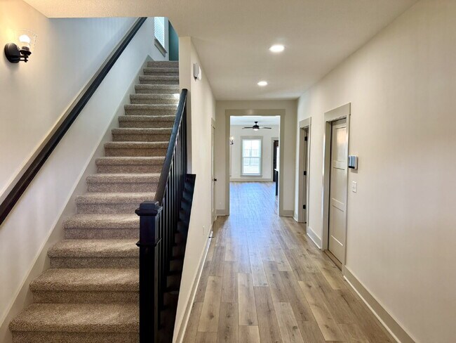 Photo - Need Space? How about 5 bedrooms, 2.5 baths + an extra bonus area upstairs so that the kids can ...