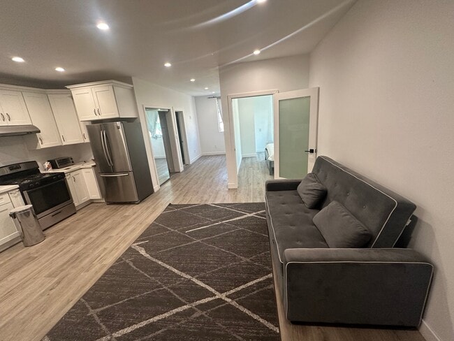 Photo - 10841 Wilkins Ave Unit 10841 1-2