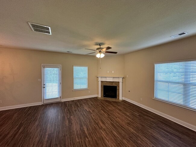 Photo - Available NOW! 4 BR/ 2.5 BA- All new flooring and paint! New PRIVACY FENCE being installed!