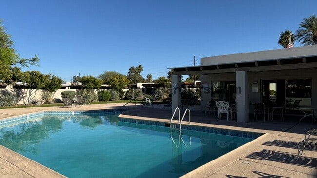 Building Photo - Three bedroom townhome with community pool