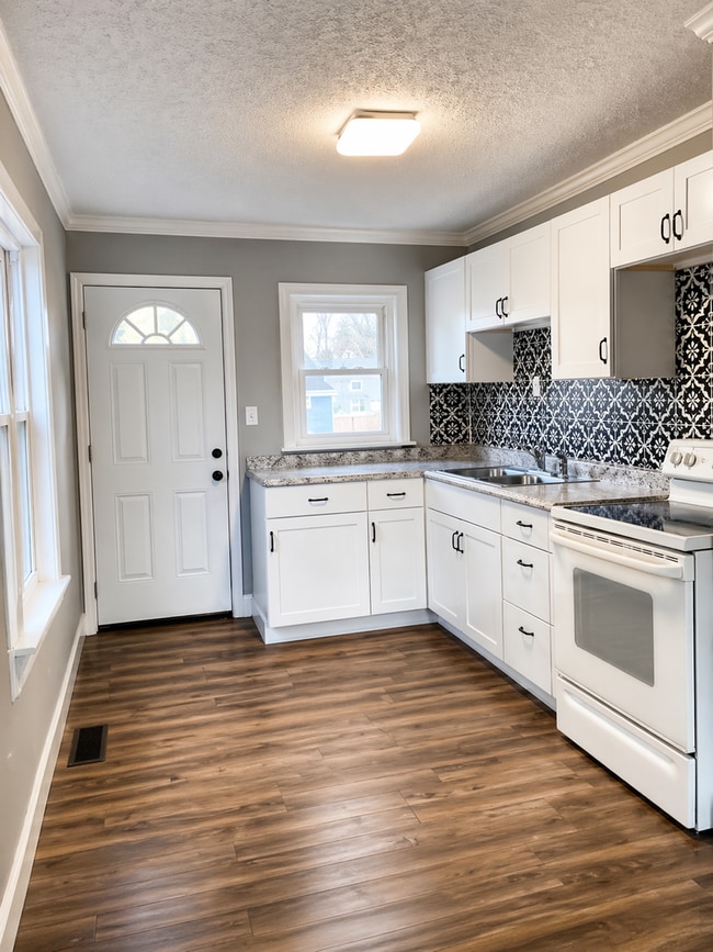 Photo - Updated 2BR Home with Finished Basement and 2-Car Garage