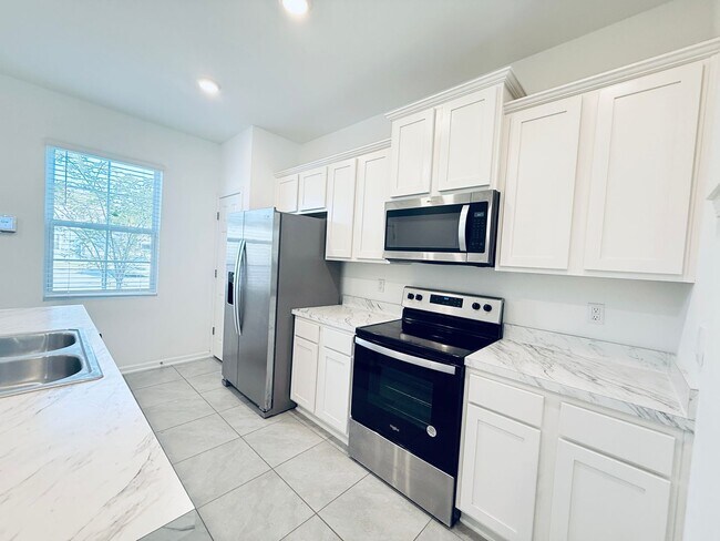 Photo - Move-In Ready Townhome with Spacious Layou...