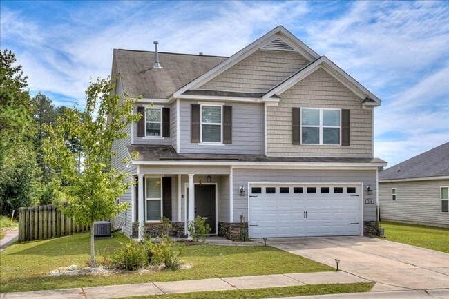 Building Photo - 4 bed, 2.5 bath home on corner lot with 2 car garage and fenced in back yard