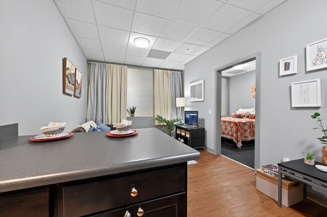 Open-Concept Kitchen and Living Room at University Plaza NIU Apartments