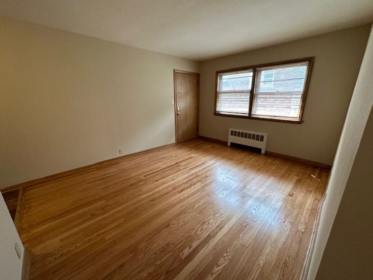 Photo - Cozy 1BR in Riverwest $895 – Heat Included | Hardwood Floors | Storage + Laundry