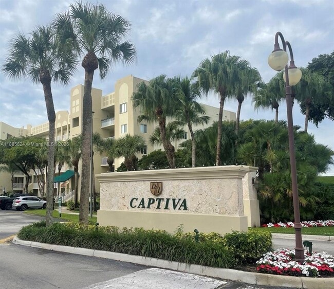 Building Photo - 10700 NW 66th St Unit 201