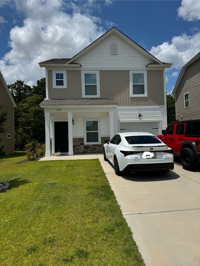 Building Photo - Wonderful Two Story Four Bedroom Home in B...