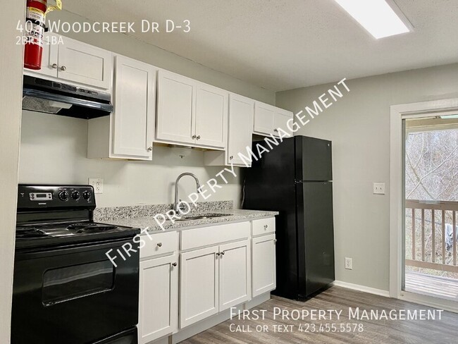Building Photo - 403 Woodcreek Dr Rental