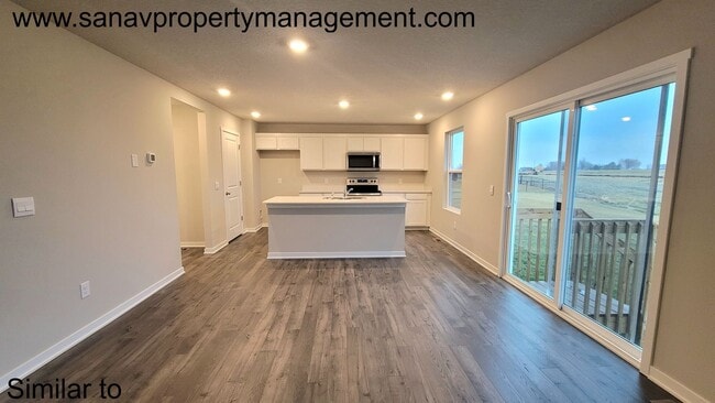 Photo - Spacious 4BR Home with Gourmet Kitchen & 3-Car Garage – Available End of May