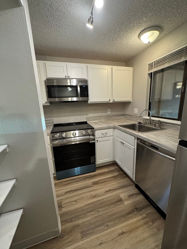 Photo - Fully Renovated 2 bedroom, 1.5 bath Apartment with New Appliances and Separate Garage!  Fully Rem...
