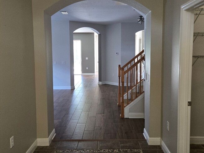 Photo - Freshly Painted 4BR/2BA Pool Home with Screened Pool & Spa – Move-In Ready!