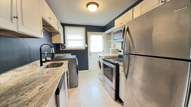Photo - Well-Maintained 3-Bedroom Home with Fenced Backyard & Assigned Parking in Central Chesapeake