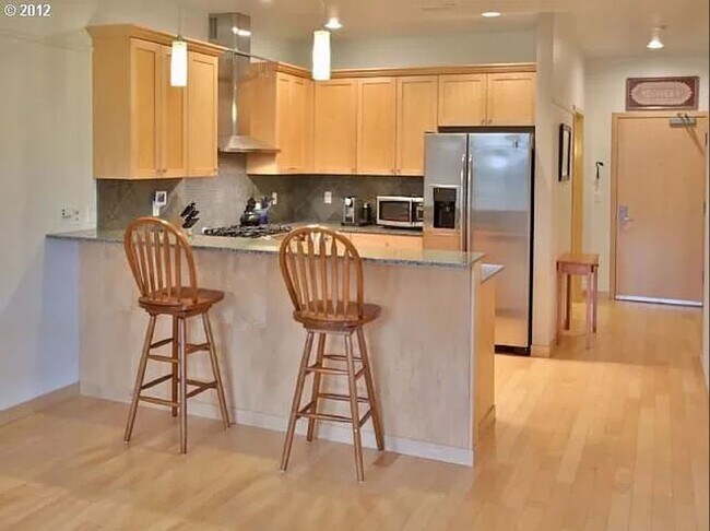 Photo - Spacious Beaumont Village Condo with Covered Balcony, W/D, Gas Fireplace