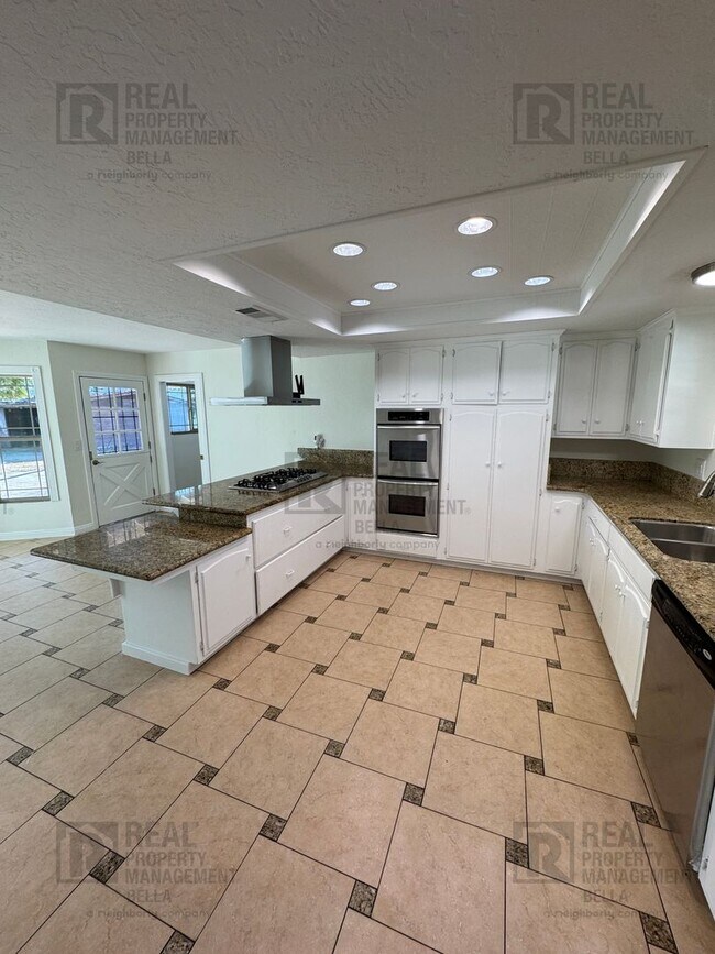 Photo - Spacious Single-Story 7-Bedroom Home with Open Layout & Abundant Natural Light