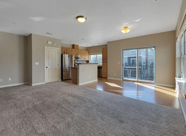 Photo - 2BR + 2.1BA Corner Townhome-Style Condo — Dual Primary Suites, Attached Garage & Most Utilities I...