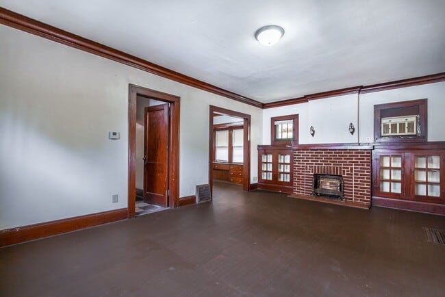 Photo - Charming 3BR Home with Classic Woodwork, Porch & Bonus Attic Space