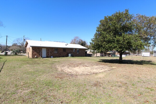 Photo - Charming 3-Bedroom Brick Home on Half an A...