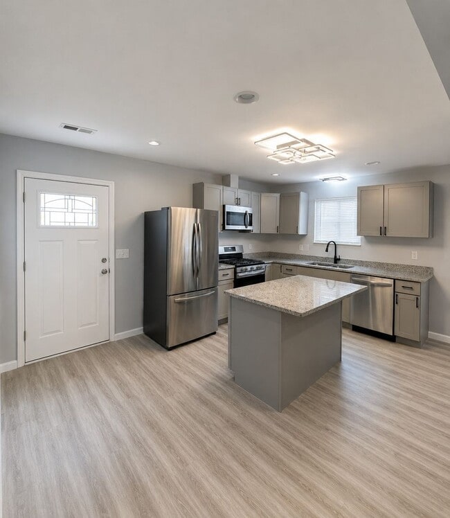 Photo - Completely Renovated 3-Bedroom Ranch with Modern Finishes & Spacious Open Kitchen
