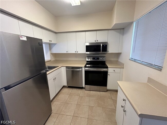 Building Photo - 8313 Bernwood Cove Loop Unit 1203