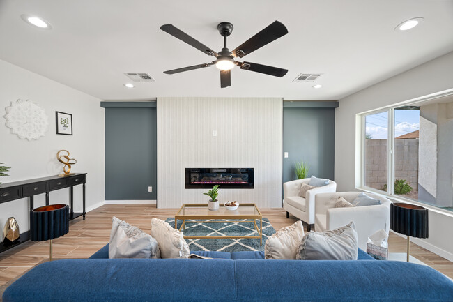 Livingroom with accent wall - 1010 E Indianola Ave House