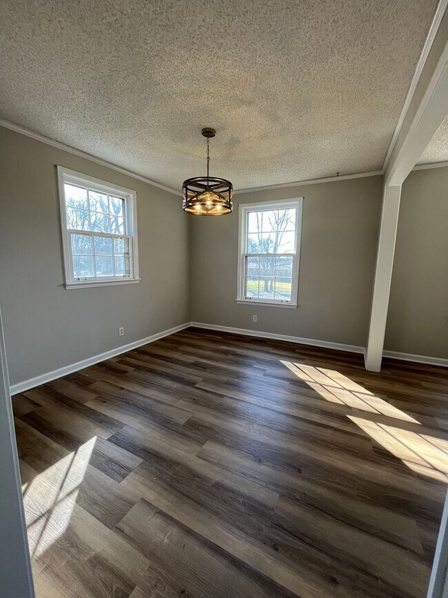 Photo - Charming 3BR/2BA Home: New Flooring, Spaci...