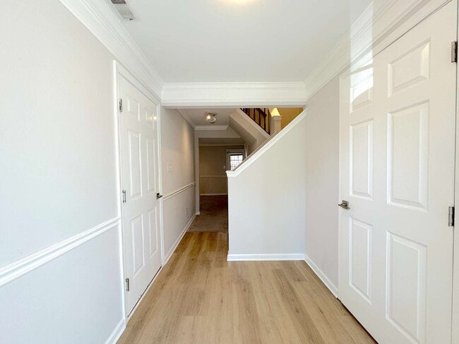 Photo - Inviting Suburban Retreat with Spacious Layout and Timeless Hardwood Flooring