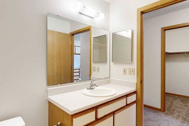 Start and end your day in a bright, private bathroom with plenty of counter space.