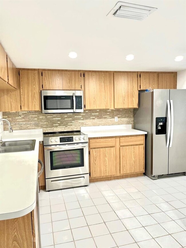 Building Photo - 1005 Palm Beach Trace Dr Unit 1005