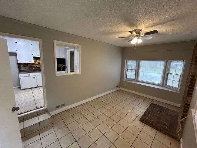 Photo - Charming 3BR Home with Bonus Den, Hardwood Floors & Fenced Backyard