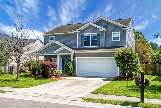 Building Photo - Comfortable Living, 4 BR 2.5 BA Home, Two Car Garage