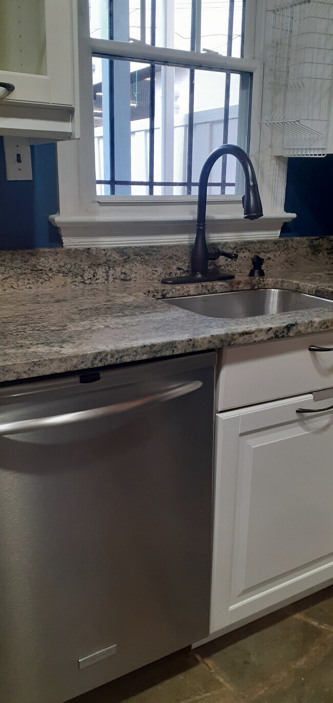 Kitchen w/stainless steel appliances - 730 6th St NE